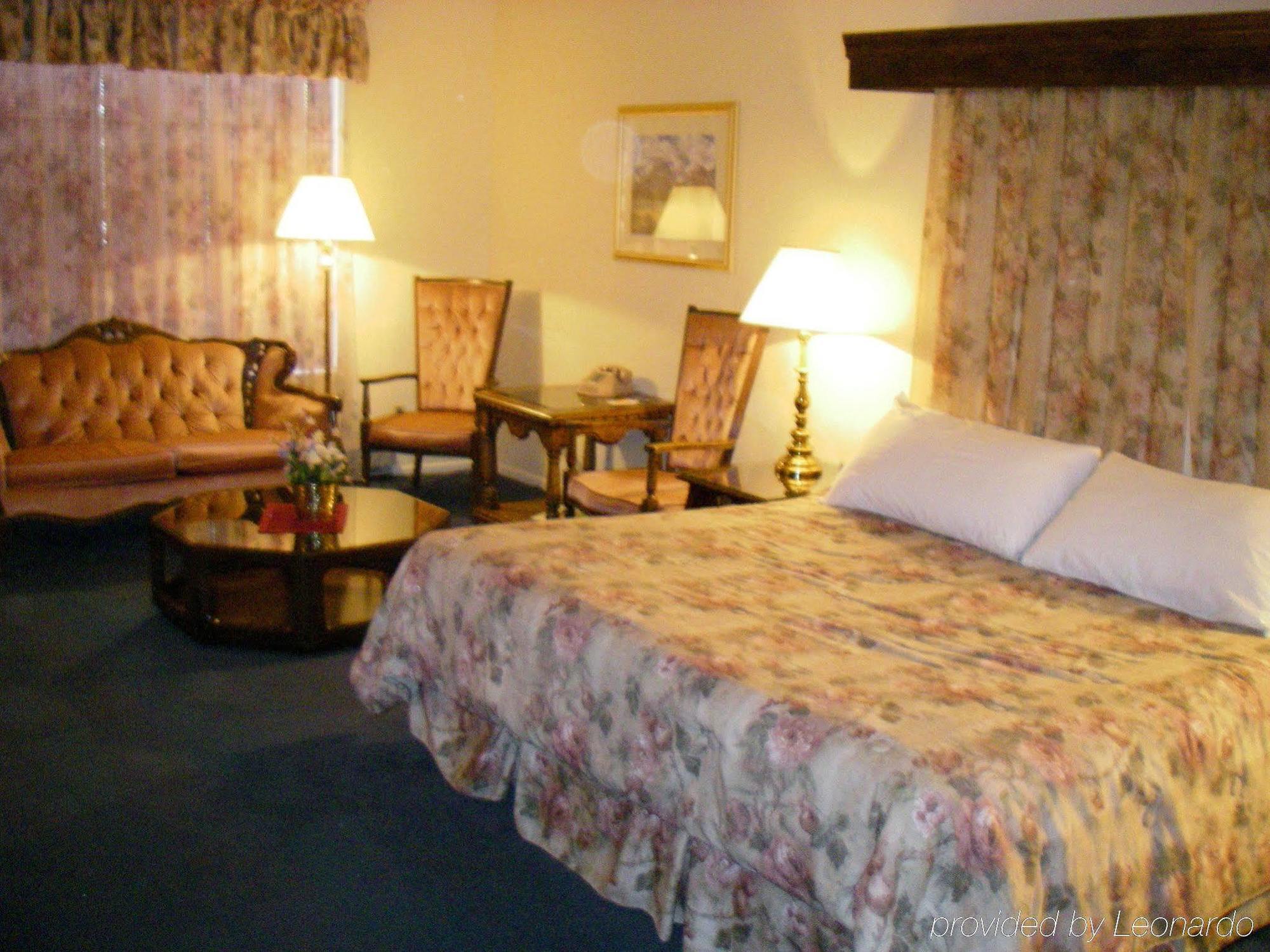 Swiss Chalet Inn Ruidoso Quarto foto